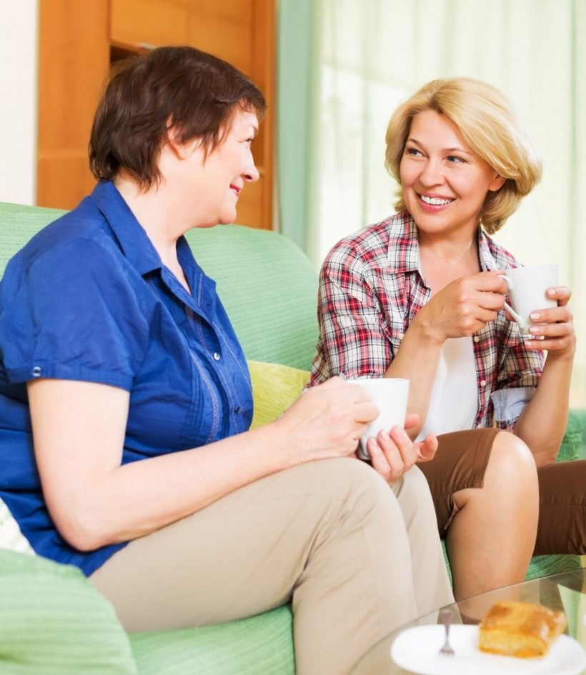 happy-colleagues-drinking-coffe-chatting-pause-lunch_1398-4029